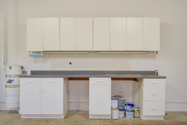 kitchen featuring white cabinets