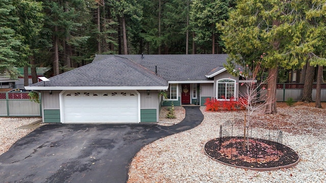 single story home featuring a garage