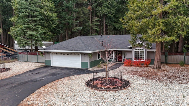 single story home featuring a garage