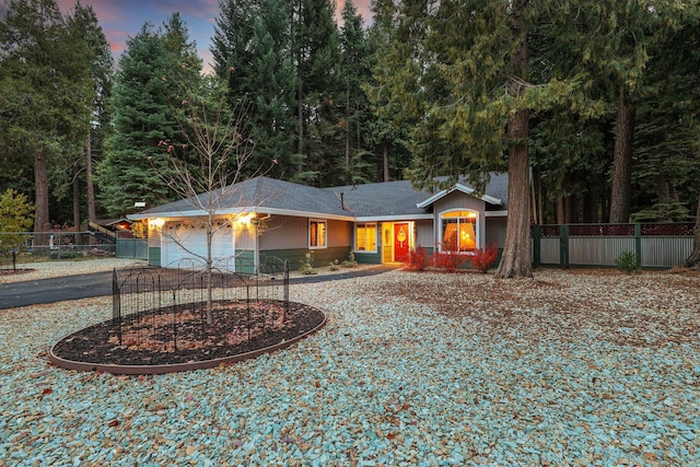 ranch-style home with a garage