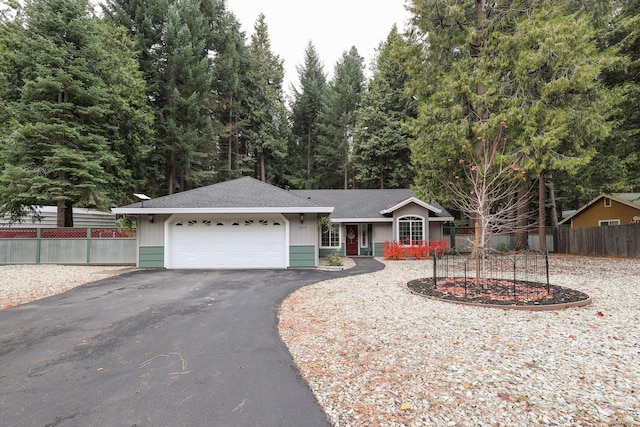 single story home featuring a garage