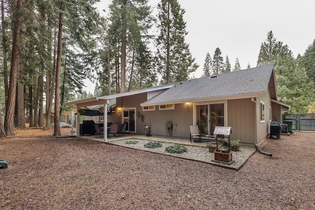 rear view of house featuring a patio area