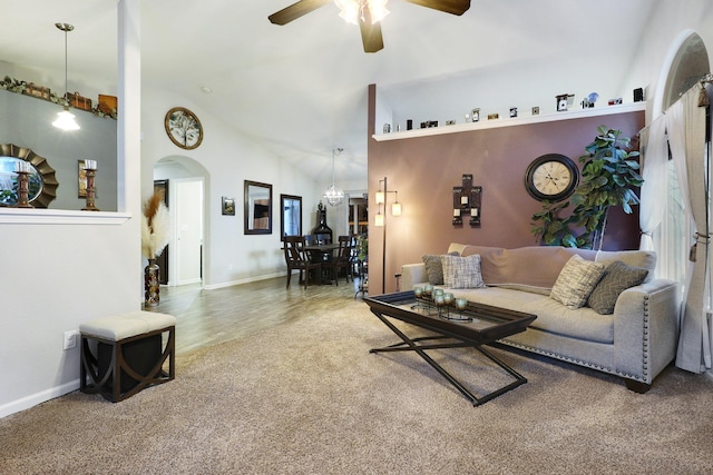 living room with carpet, high vaulted ceiling, and ceiling fan