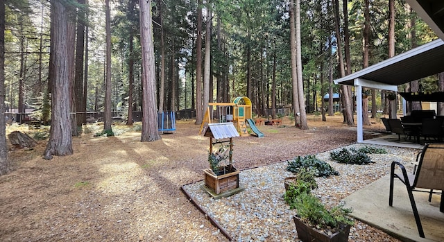 view of yard with a playground