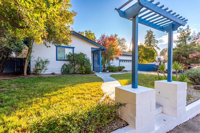 exterior space featuring a front yard and a garage