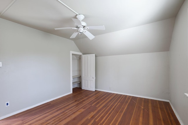 bonus room with dark hardwood / wood-style flooring, vaulted ceiling, and ceiling fan