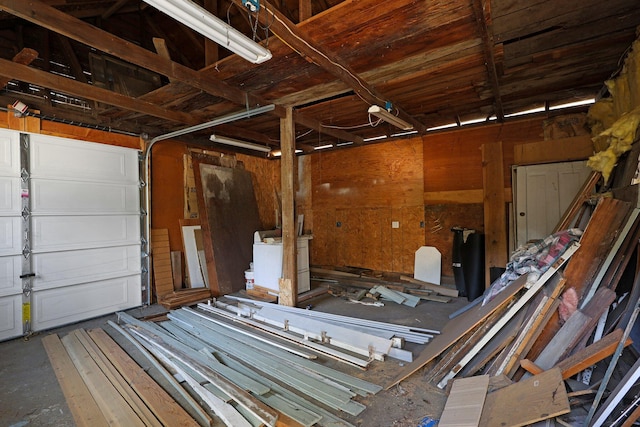 garage with wood walls