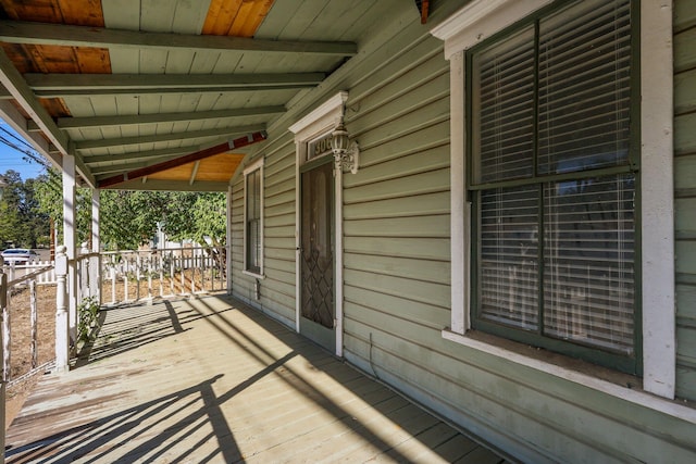 wooden terrace featuring a porch