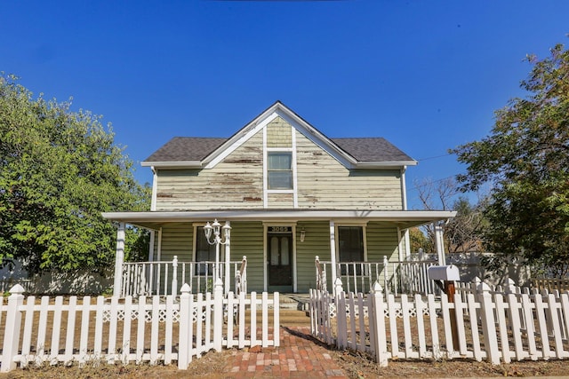 farmhouse-style home with covered porch