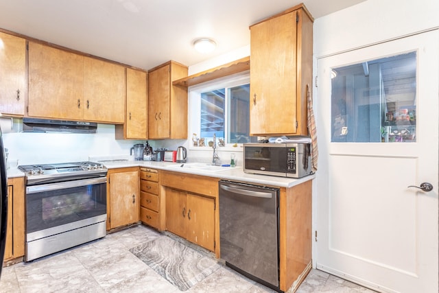 kitchen featuring appliances with stainless steel finishes and sink