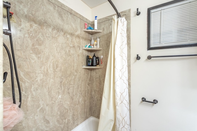 bathroom featuring shower / bath combination with curtain