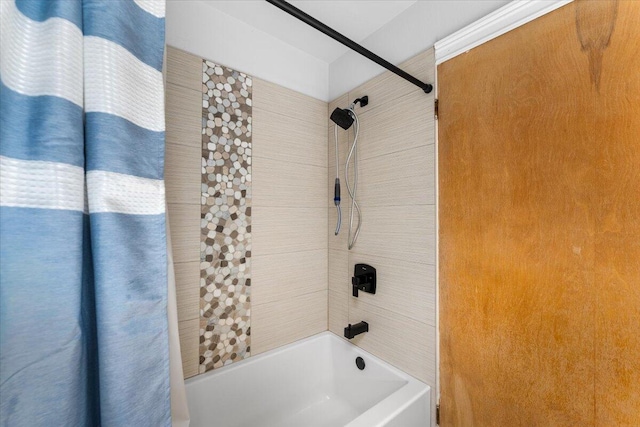 bathroom featuring shower / bath combo with shower curtain