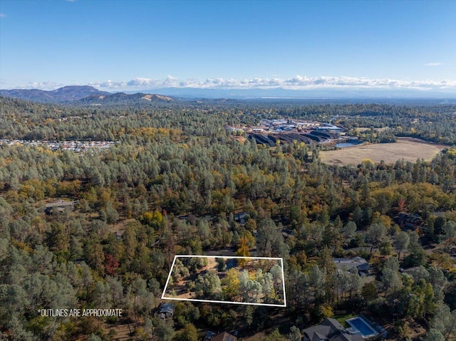 18142 Ranchera Rd, Shasta Lake, CA 96019 - aerial view of property and surrounding area featuring property boundaries highlighted and mountains