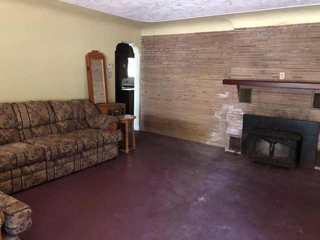 living room featuring a wood stove