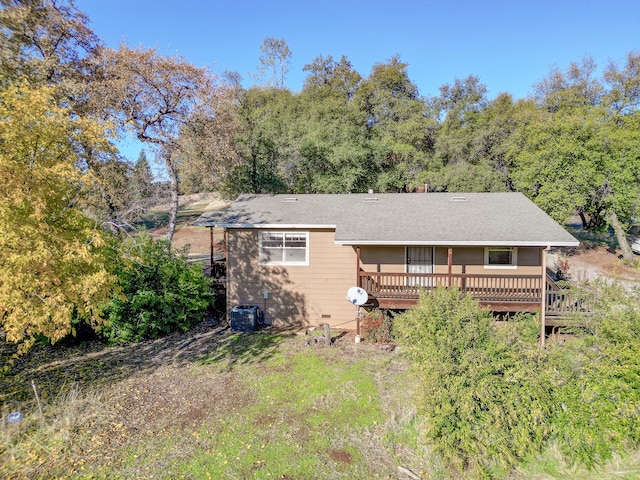 rear view of house with a deck