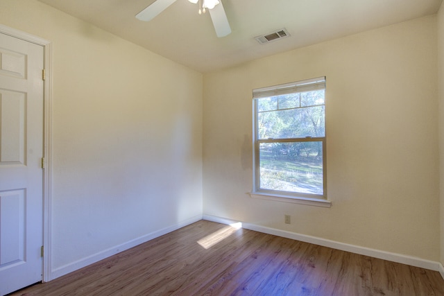 unfurnished room featuring ceiling fan and light wood-type flooring