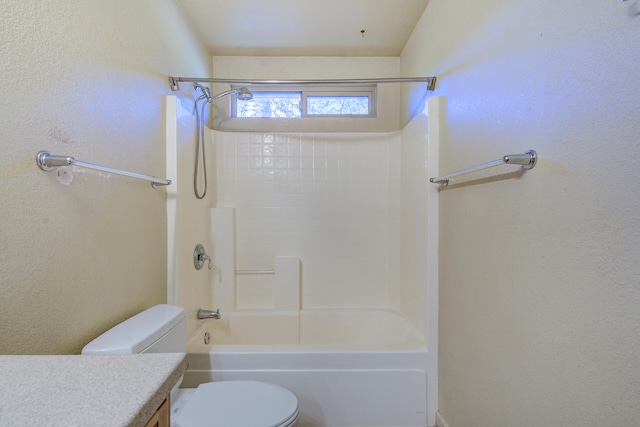 full bathroom featuring shower / tub combination, vanity, toilet, and vaulted ceiling