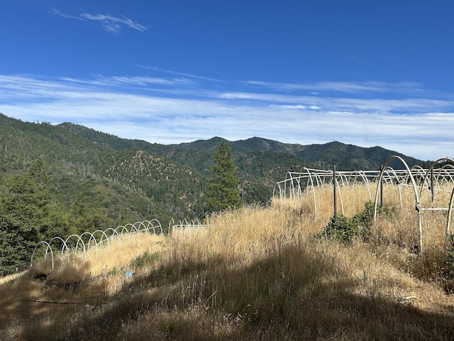 view of mountain feature with a rural view