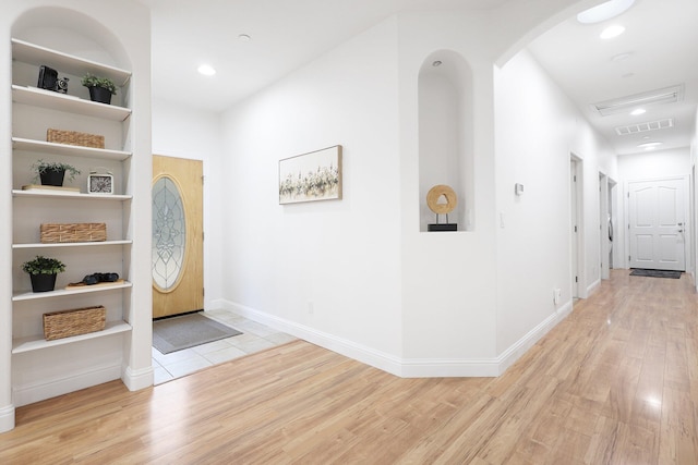 foyer entrance featuring light wood-type flooring