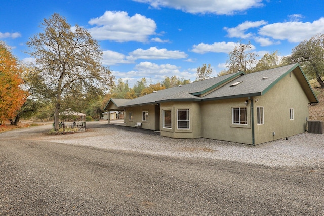 view of front of home featuring cooling unit