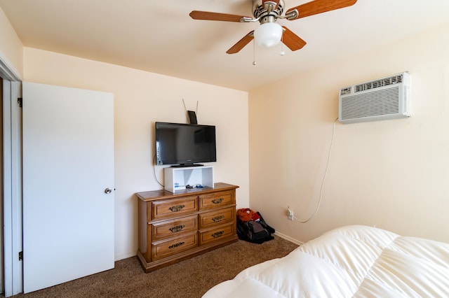 carpeted bedroom with ceiling fan and an AC wall unit