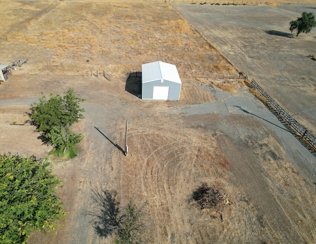 birds eye view of property featuring a rural view