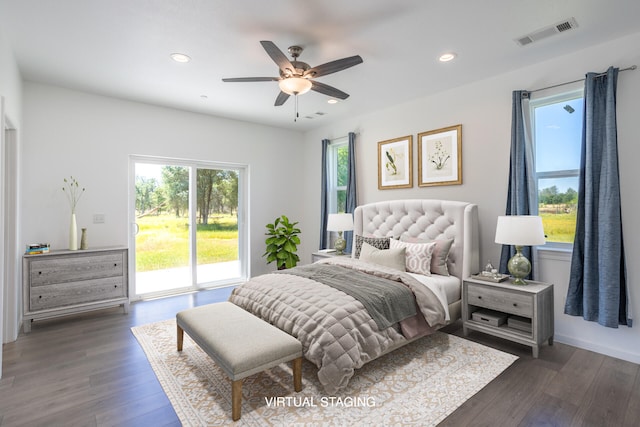 bedroom featuring access to outside, ceiling fan, and dark hardwood / wood-style flooring