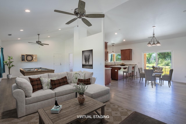 living room featuring ceiling fan, dark wood-type flooring, sink, high vaulted ceiling, and pool table