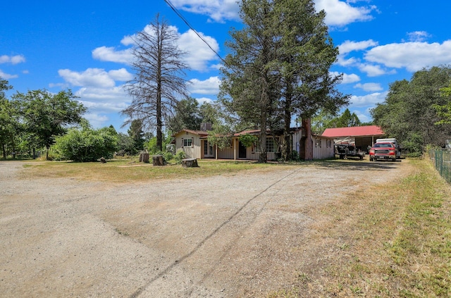 view of front of home with a carport