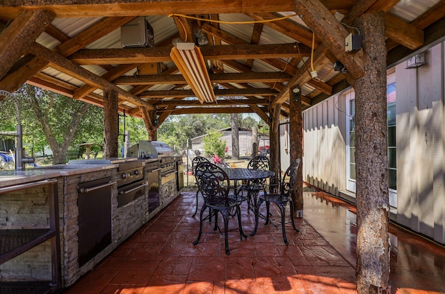 view of patio / terrace featuring exterior kitchen