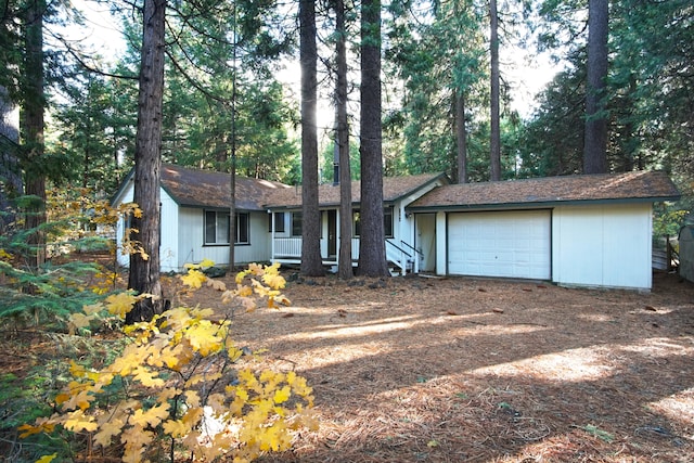 single story home with a garage