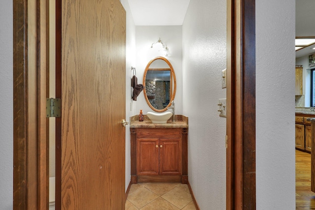 bathroom featuring vanity and hardwood / wood-style flooring