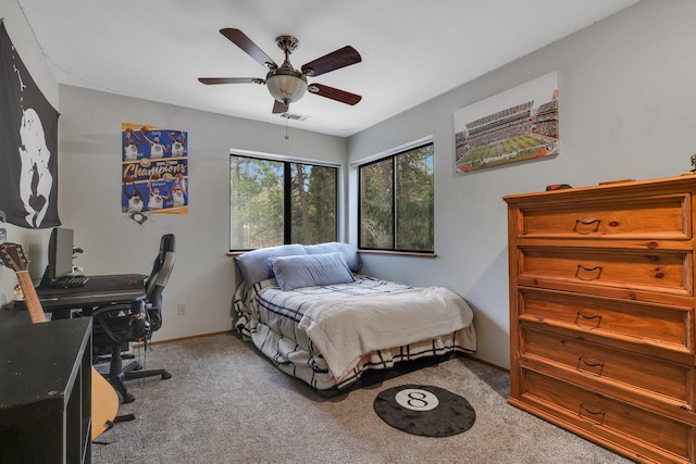 carpeted bedroom with ceiling fan