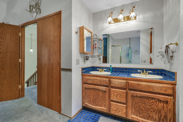 bathroom with vanity and walk in shower