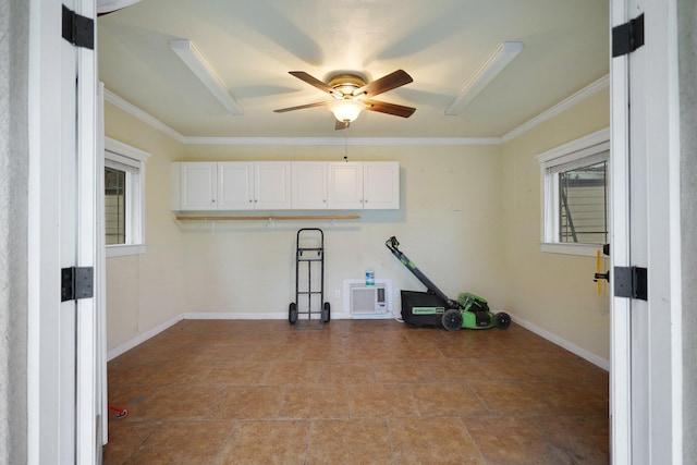 laundry area with ceiling fan and ornamental molding