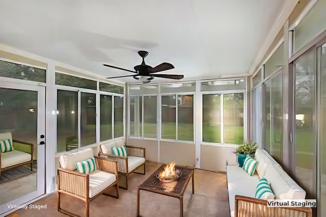 sunroom / solarium with ceiling fan