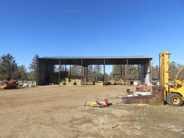 exterior space featuring an outbuilding