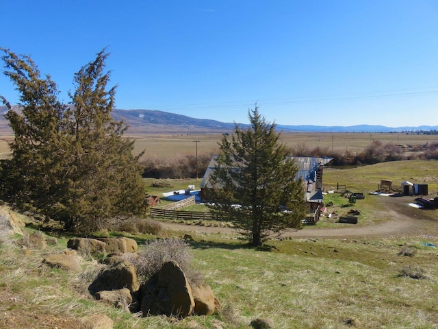 view of mountain feature featuring a rural view