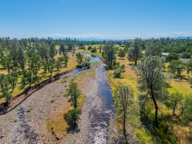 birds eye view of property featuring a rural view