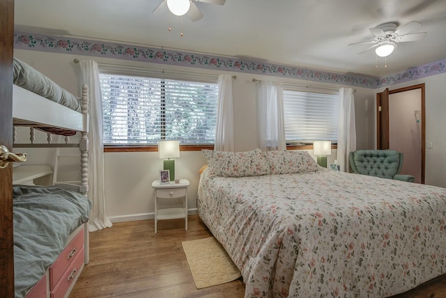 bedroom featuring ceiling fan and wood-type flooring