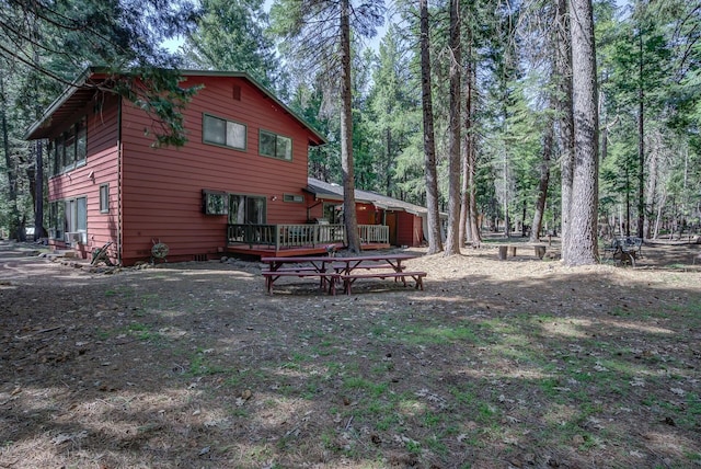 view of yard with a deck