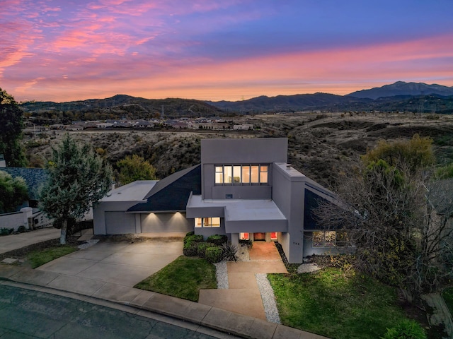 view of front of home with a mountain view