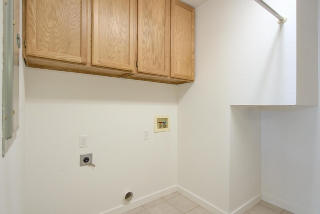 738 Sunriver Ln, Redding, CA 96001 - washroom featuring hookup for an electric dryer, cabinet space, hookup for a washing machine, and light tile patterned flooring