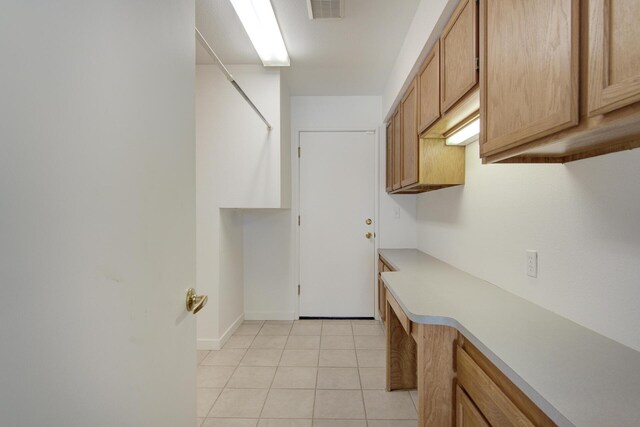 738 Sunriver Ln, Redding, CA 96001 - laundry room with light tile patterned flooring