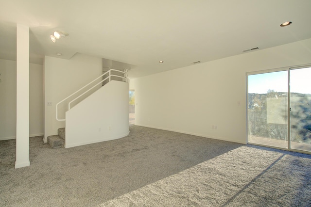 738 Sunriver Ln, Redding, CA 96001 - unfurnished living room featuring carpet flooring, stairway, and recessed lighting
