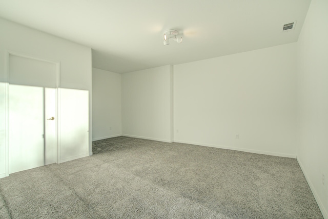 spare room featuring carpet flooring