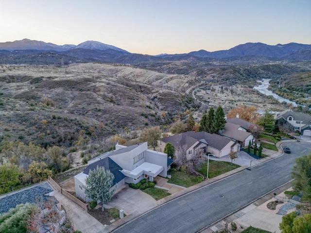 aerial view at dusk with a mountain view