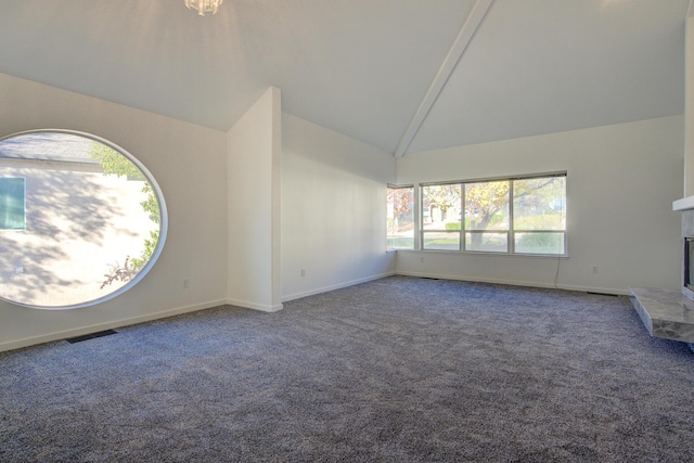 738 Sunriver Ln, Redding, CA 96001 - unfurnished living room with carpet floors, high vaulted ceiling, and a fireplace with raised hearth