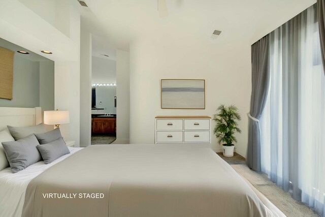 738 Sunriver Ln, Redding, CA 96001 - bedroom featuring light carpet and connected bathroom
