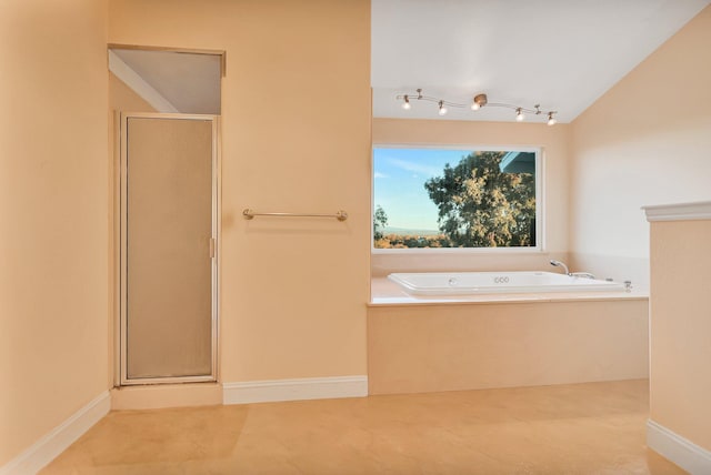 bathroom with independent shower and bath and vaulted ceiling